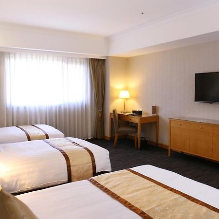 Fushin Hotel - Тайнан Екстериор снимка