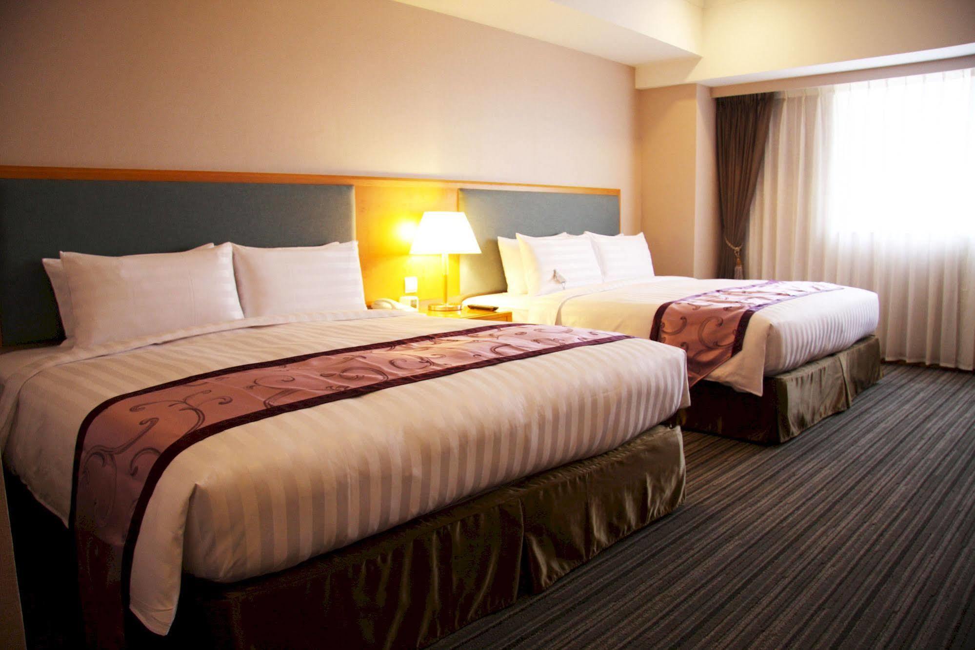 Fushin Hotel - Тайнан Екстериор снимка